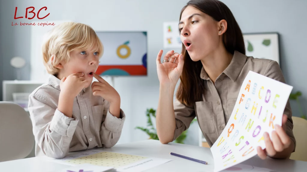 A child and an adult together vocalize articulated sounds during a playful language workshop