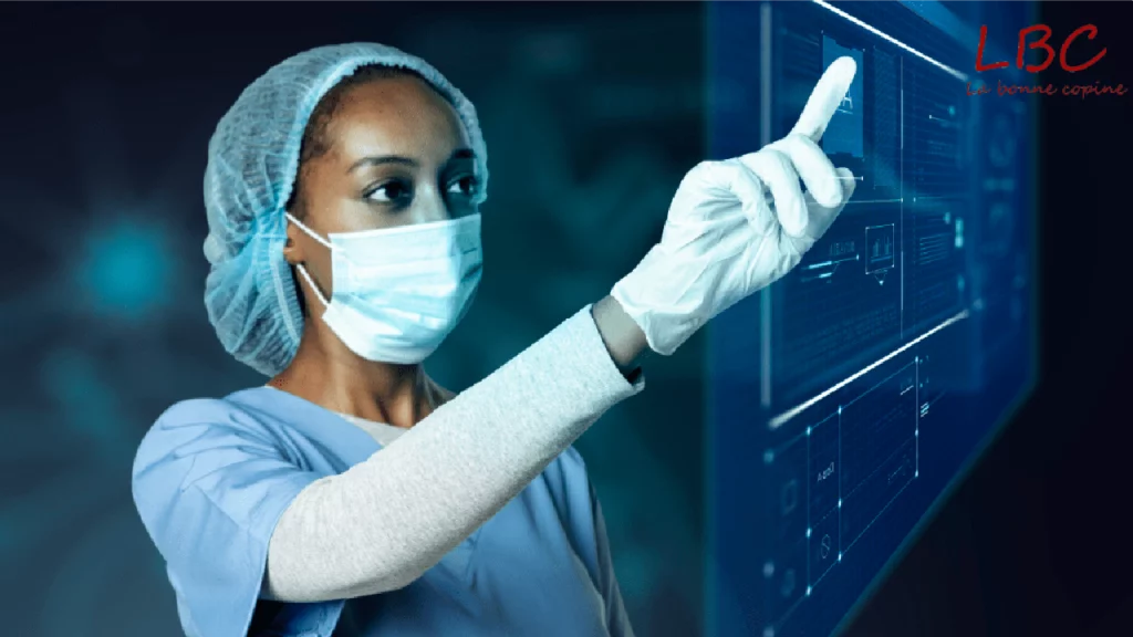 A nurse in a medical gown interacts with a touchscreen in a high-tech hospital environment, reflecting the future of connected medicine | labonnecopine.com/en