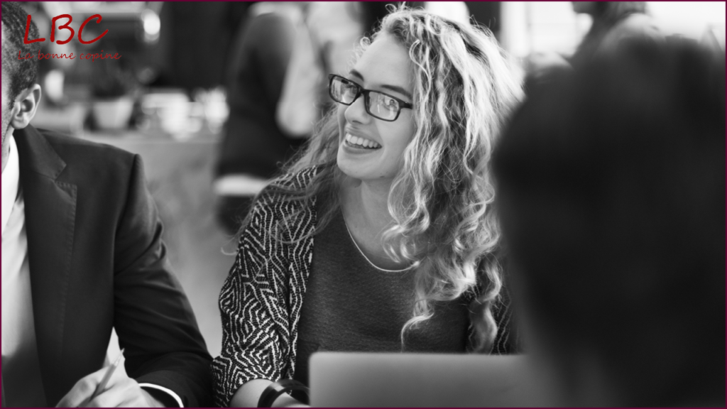 A smiling woman engaged in lively conversation